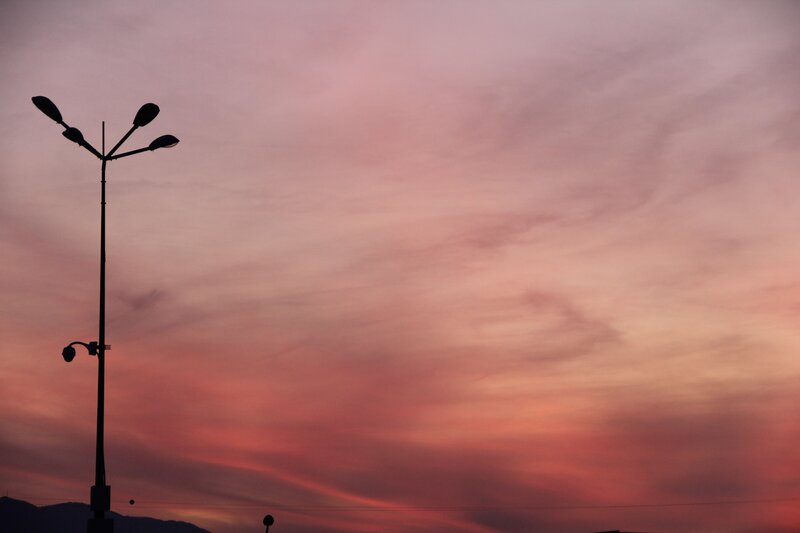 silhouette of street lamp at sunset
