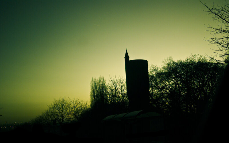 silhouette of tower at dusk