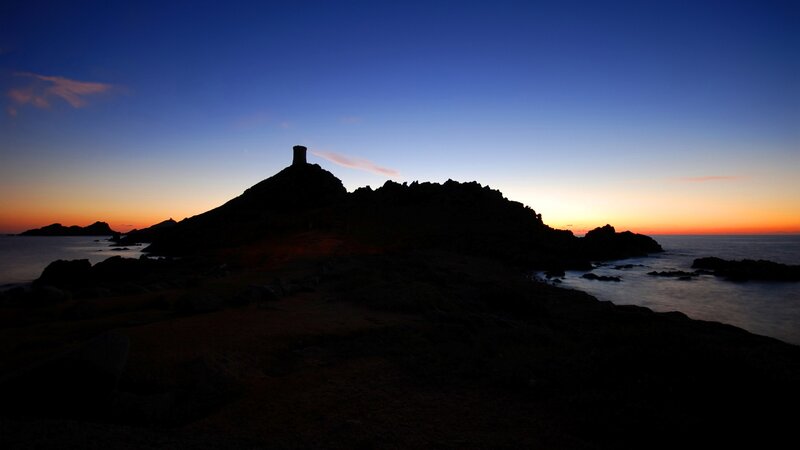silhouette of tower at sunset