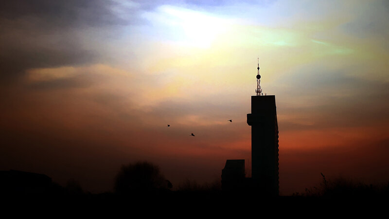 Silhouette of tower at sunset