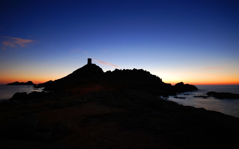 Silhouette of Tower on Rock