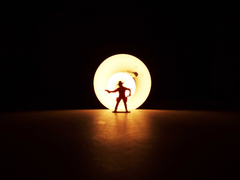 silhouette of toy figure