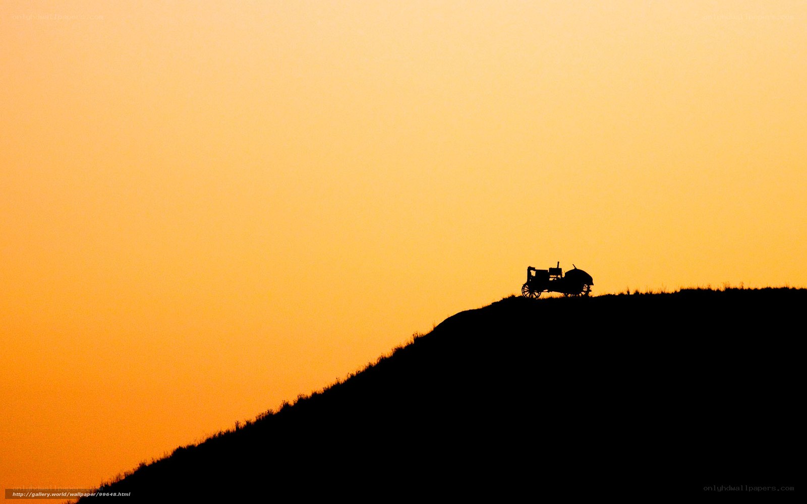 Silhouette of Tractor on Hill