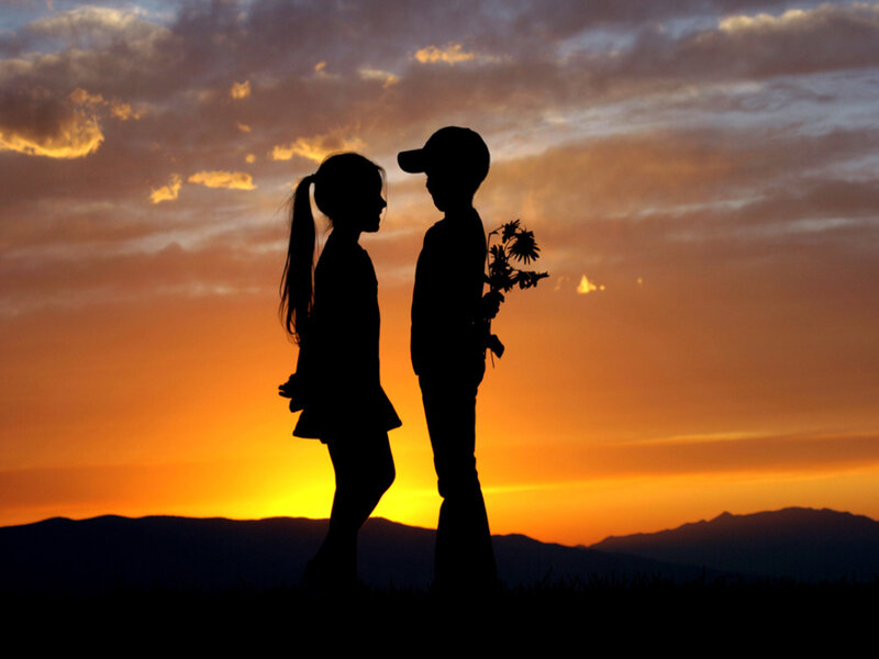 Silhouette of Two Children — Orange