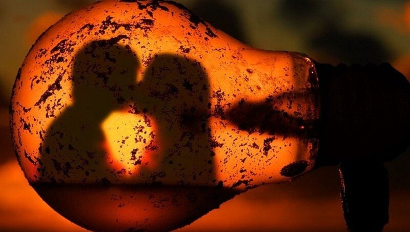 Silhouette of Two People — Orange, Dramatic