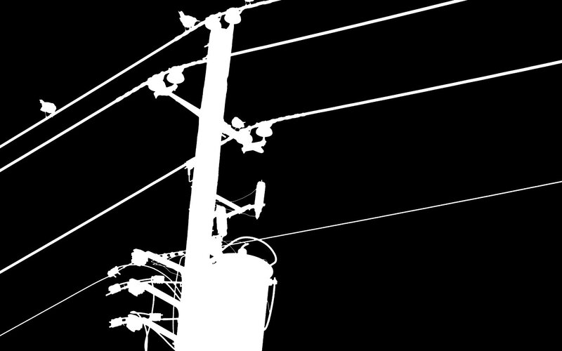 silhouette of utility pole