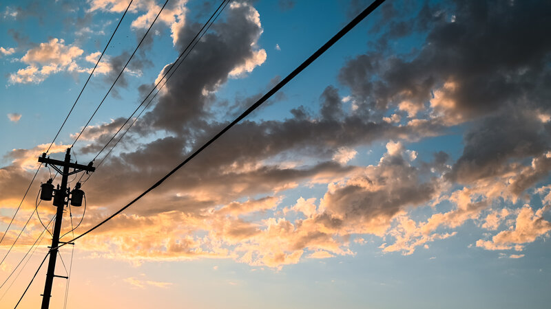Silhouette of Utility Pole — Blue, Dramatic, Sunset