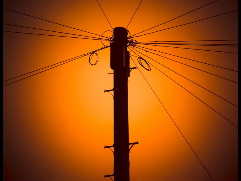Silhouette of Utility Pole — Orange