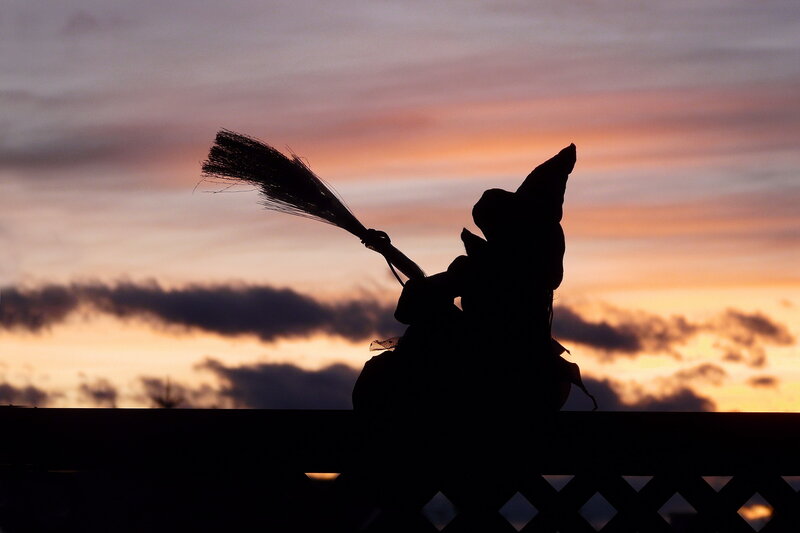 Silhouette of Witch on Broom — Orange, Dramatic, Sunset