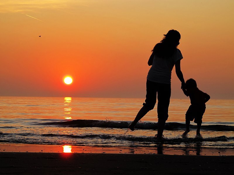 Silhouette of Woman and Child — Orange