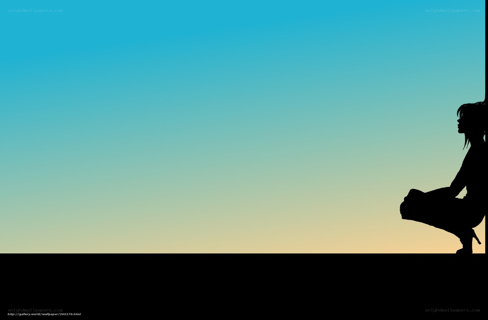 silhouette of woman at sunset