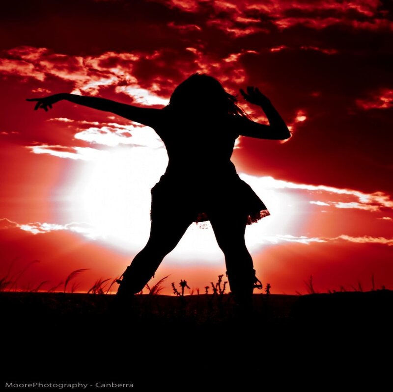Silhouette of Woman Dancing — Red