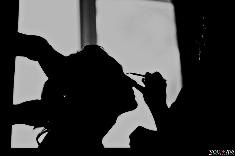 Silhouette of Woman Getting Makeup
