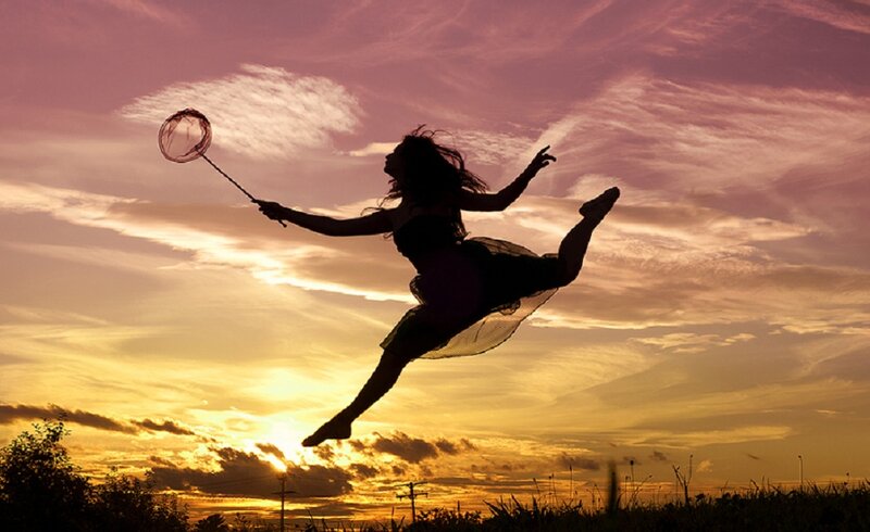 Silhouette of Woman Jumping — Purple