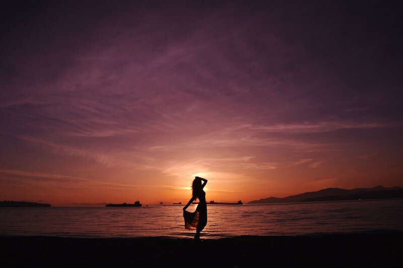 Silhouette of Woman on Beach — Purple, Dramatic, Sunset