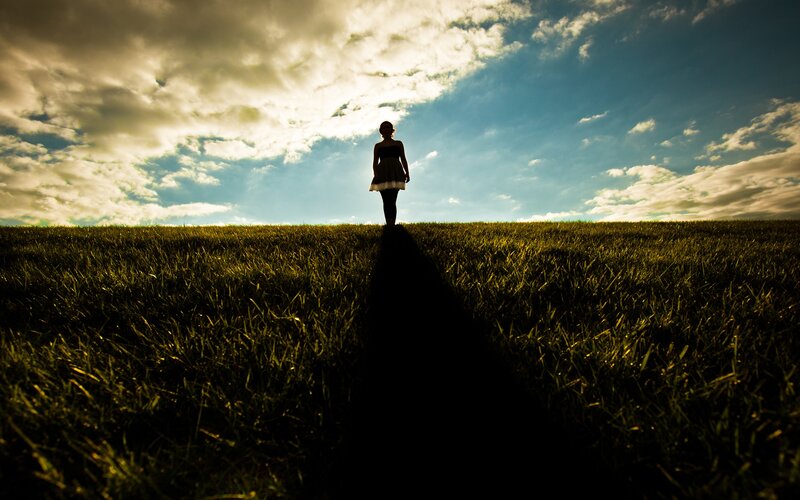 Silhouette of Woman on Hill — Green, Dramatic, Sunset