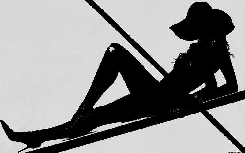 silhouette of woman on lounge chair