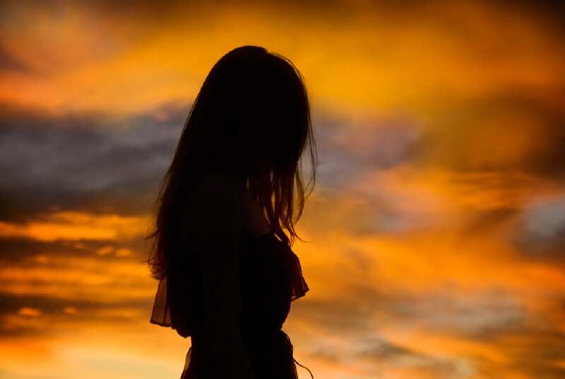 Silhouette of Woman — Orange, Dramatic