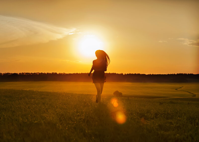 Silhouette of Woman Running — Orange, Serene