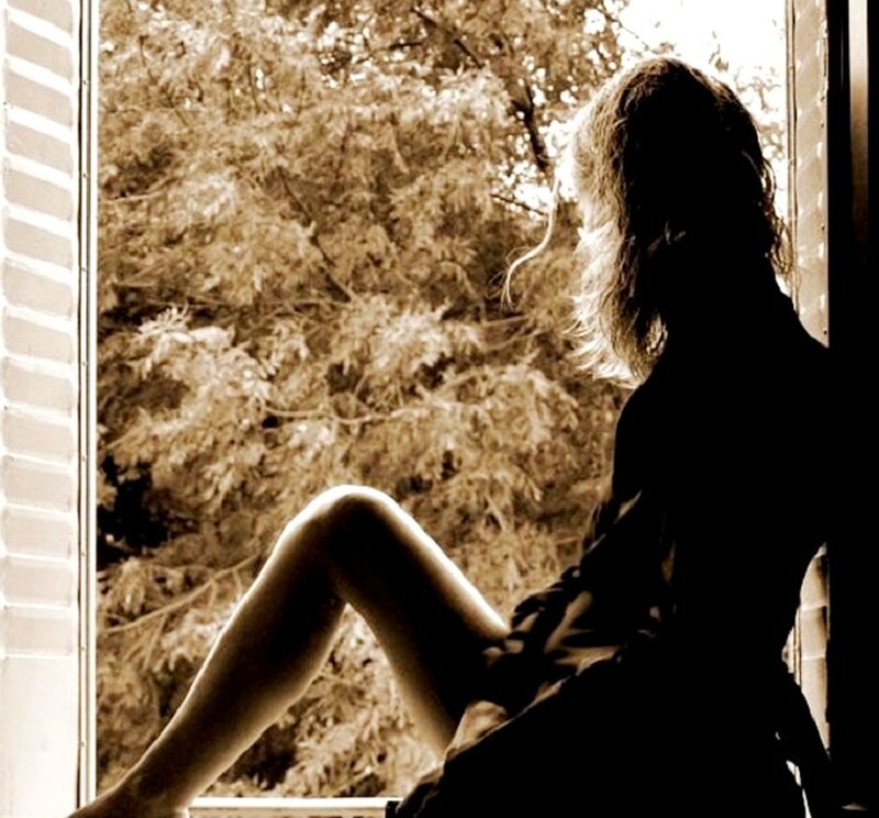 Silhouette of Woman Sitting — Brown, Contemplative