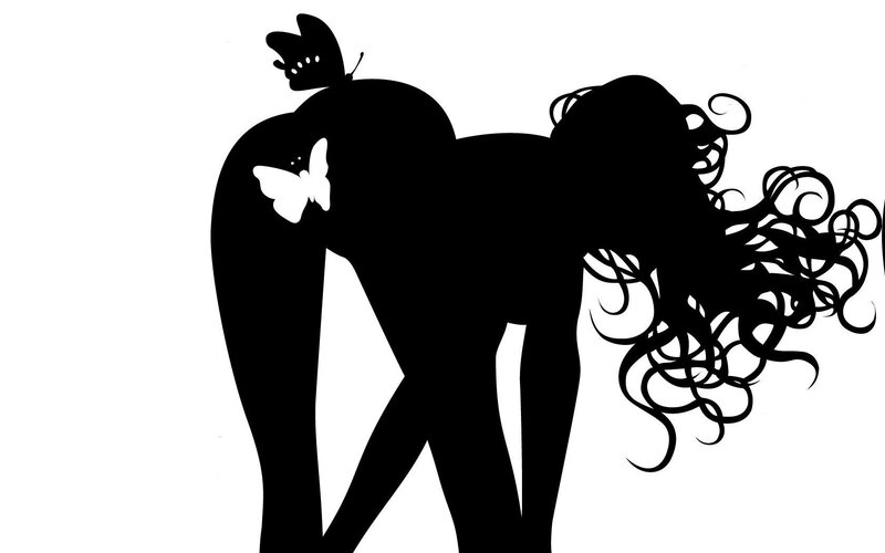 silhouette of woman with butterflies