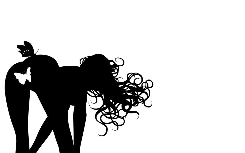 silhouette of woman with butterflies