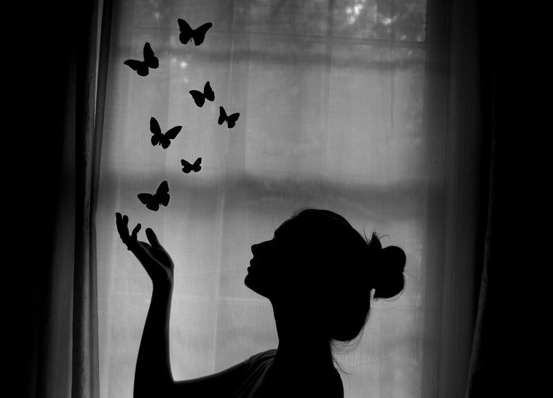 Silhouette of Woman with Butterflies — Black