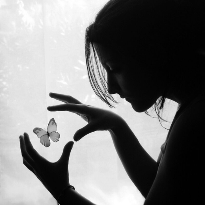 Silhouette of Woman with Butterfly — Black, Serene
