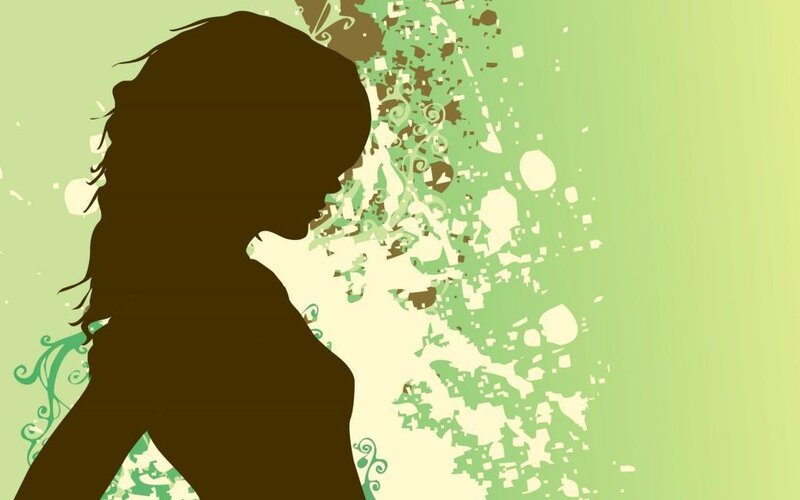 silhouette of woman with floral background