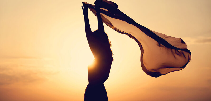 Silhouette of Woman with Scarf — Orange, Serene