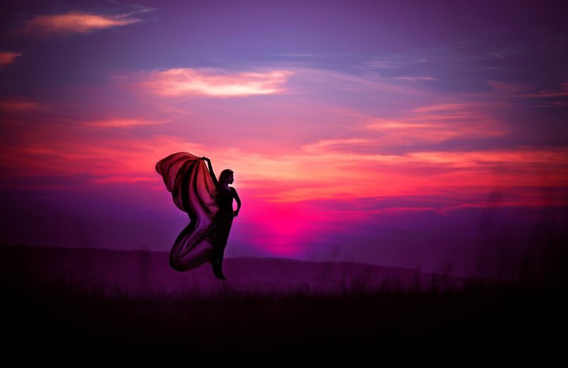 Silhouette of Woman with Scarf — Purple, Dramatic, Sunset