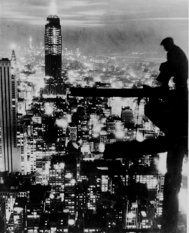 Silhouette of worker at night