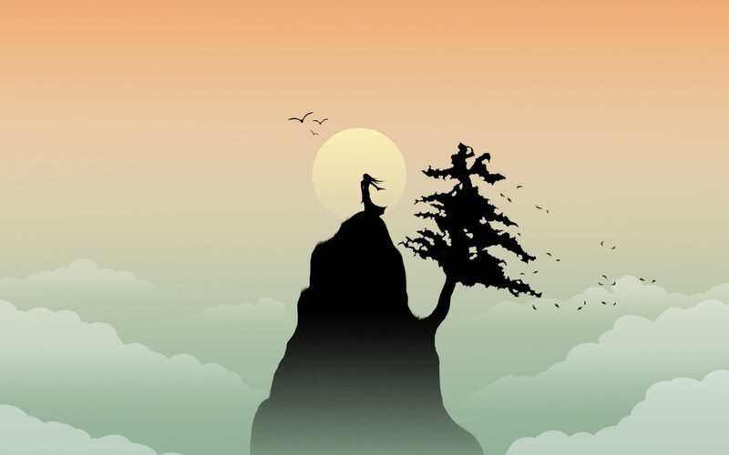 silhouette on a cliff at sunset