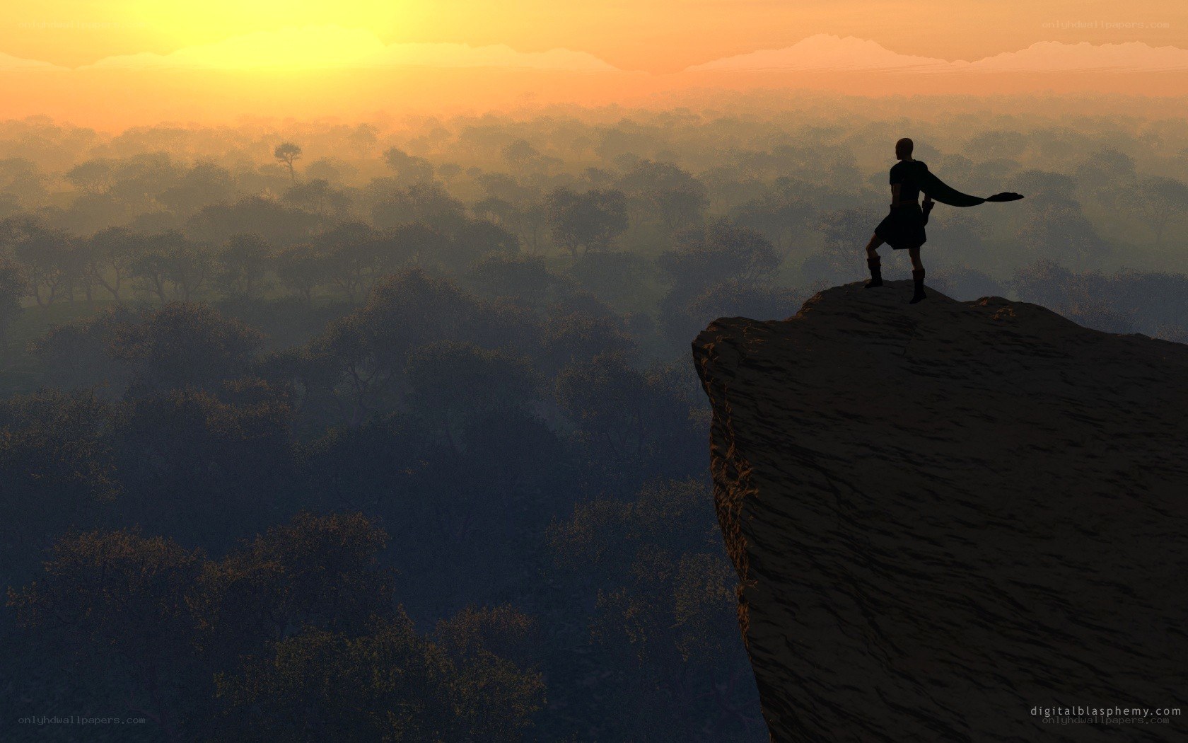 Silhouette on a cliff at sunset