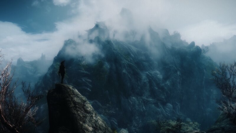Silhouette on a Cliff — Blue