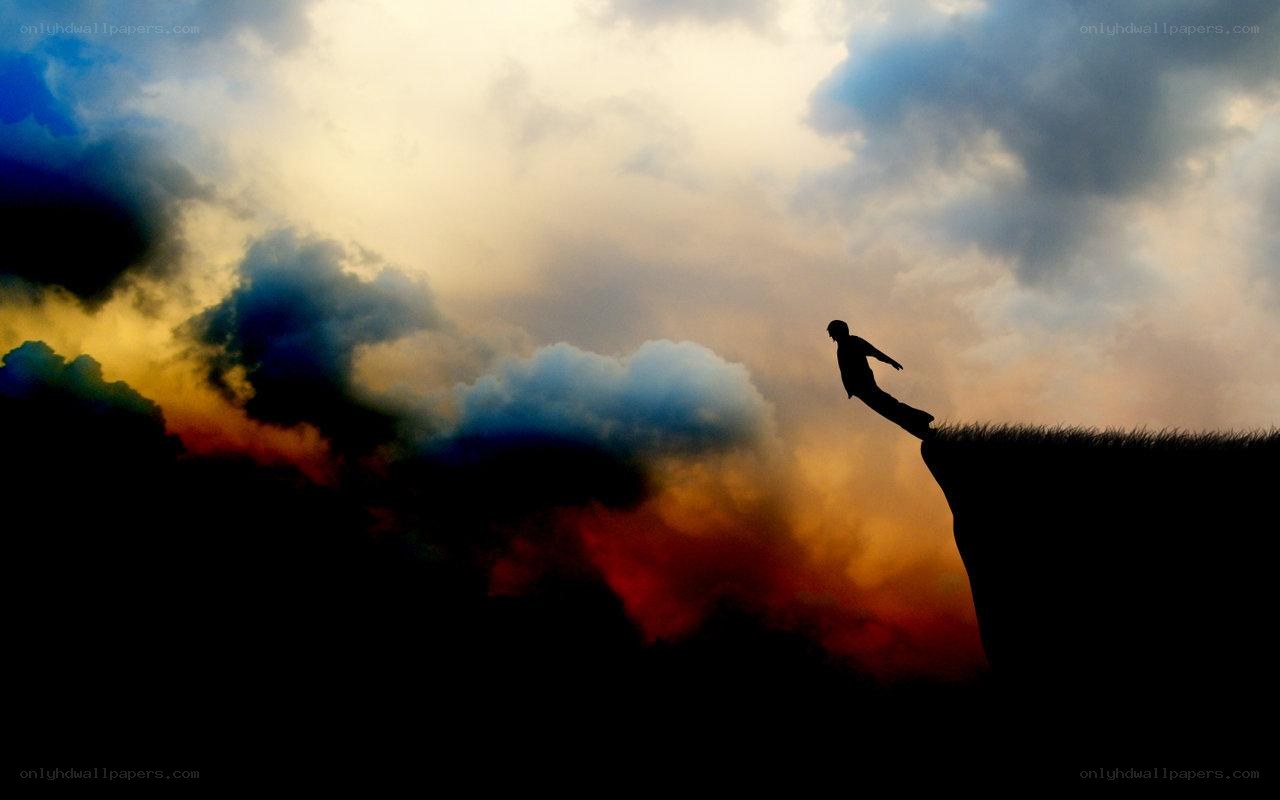 Silhouette on a cliff edge
