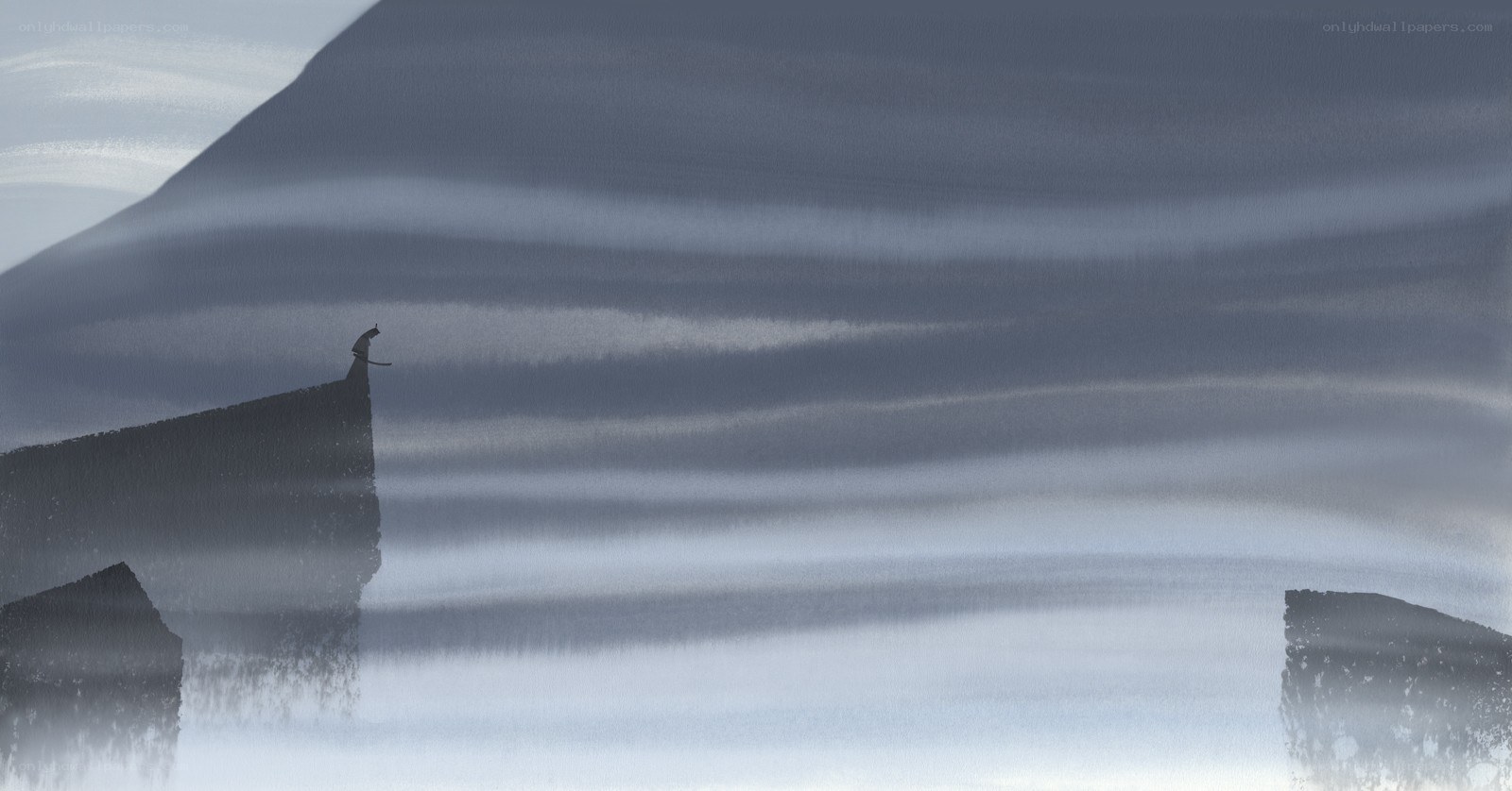 Silhouette on a cliff edge
