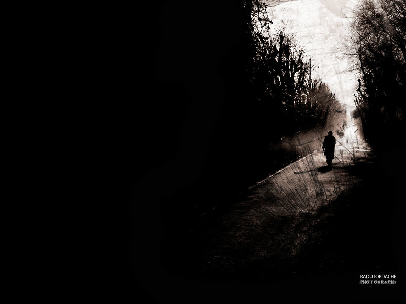 Silhouette on a dark path