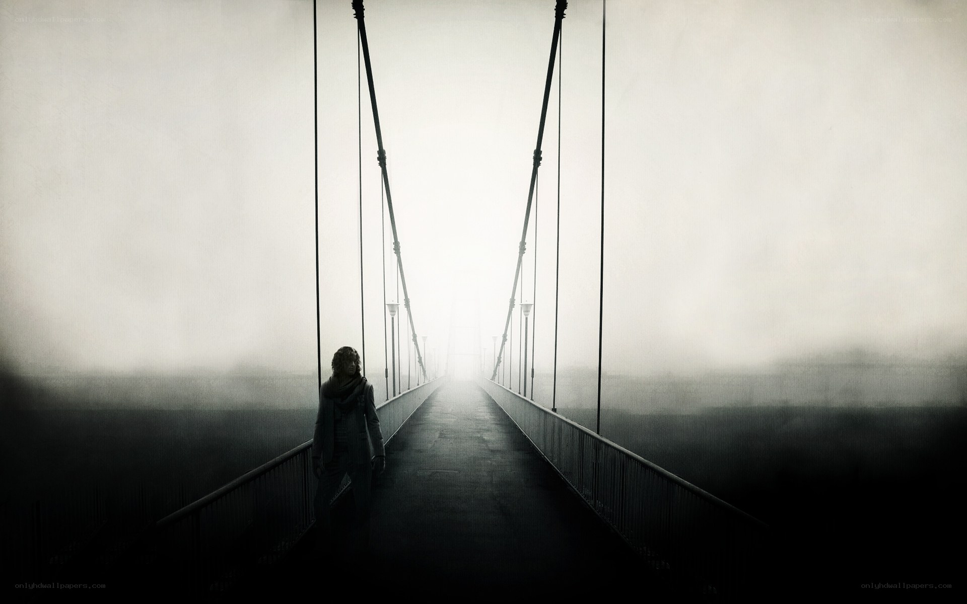 Silhouette on a foggy bridge