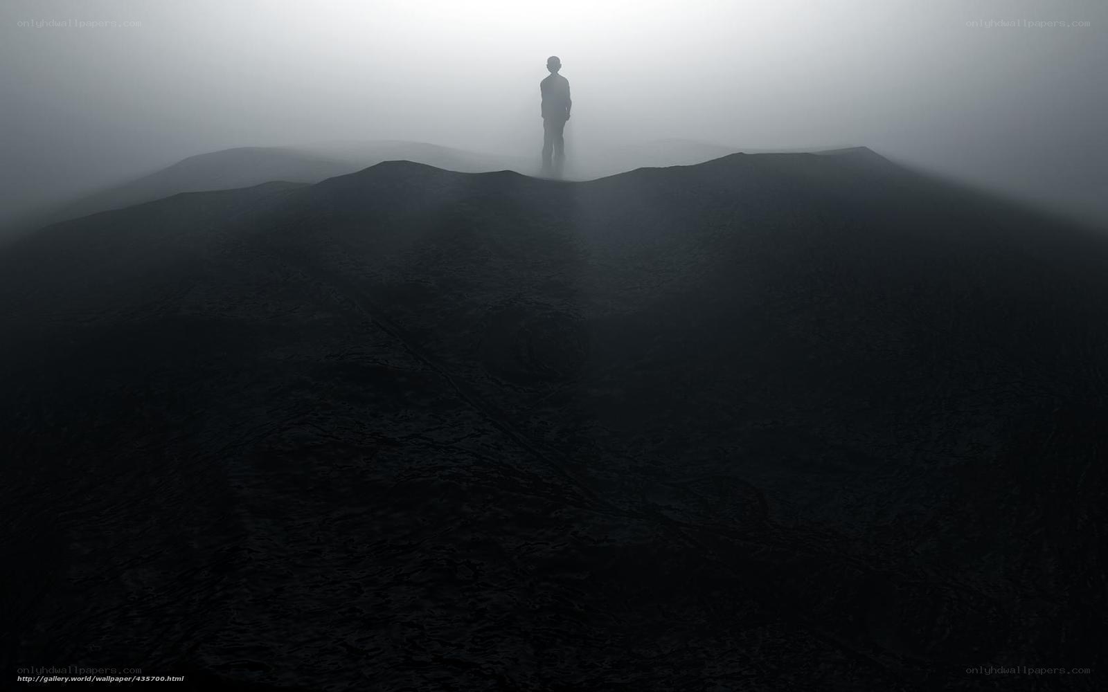 Silhouette on a foggy hill