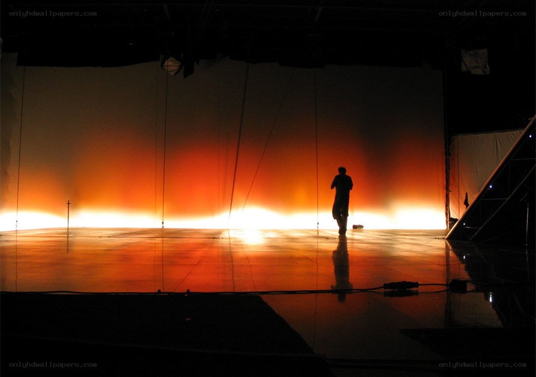 Silhouette on a lit stage