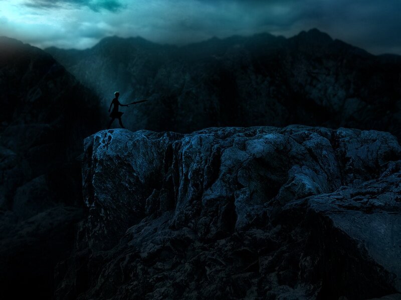 Silhouette on a mountain peak