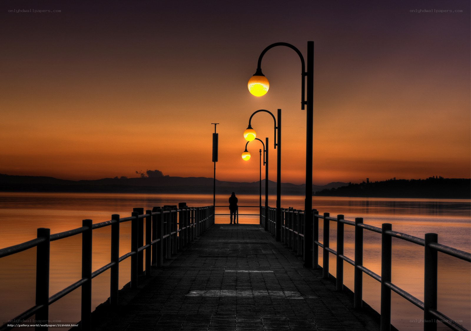 Silhouette on a Pier at Sunset
