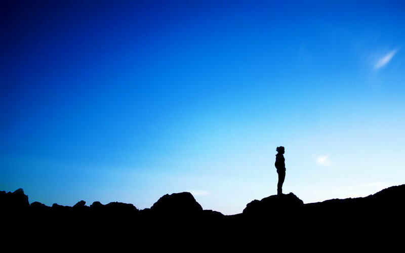 Silhouette on a rocky peak