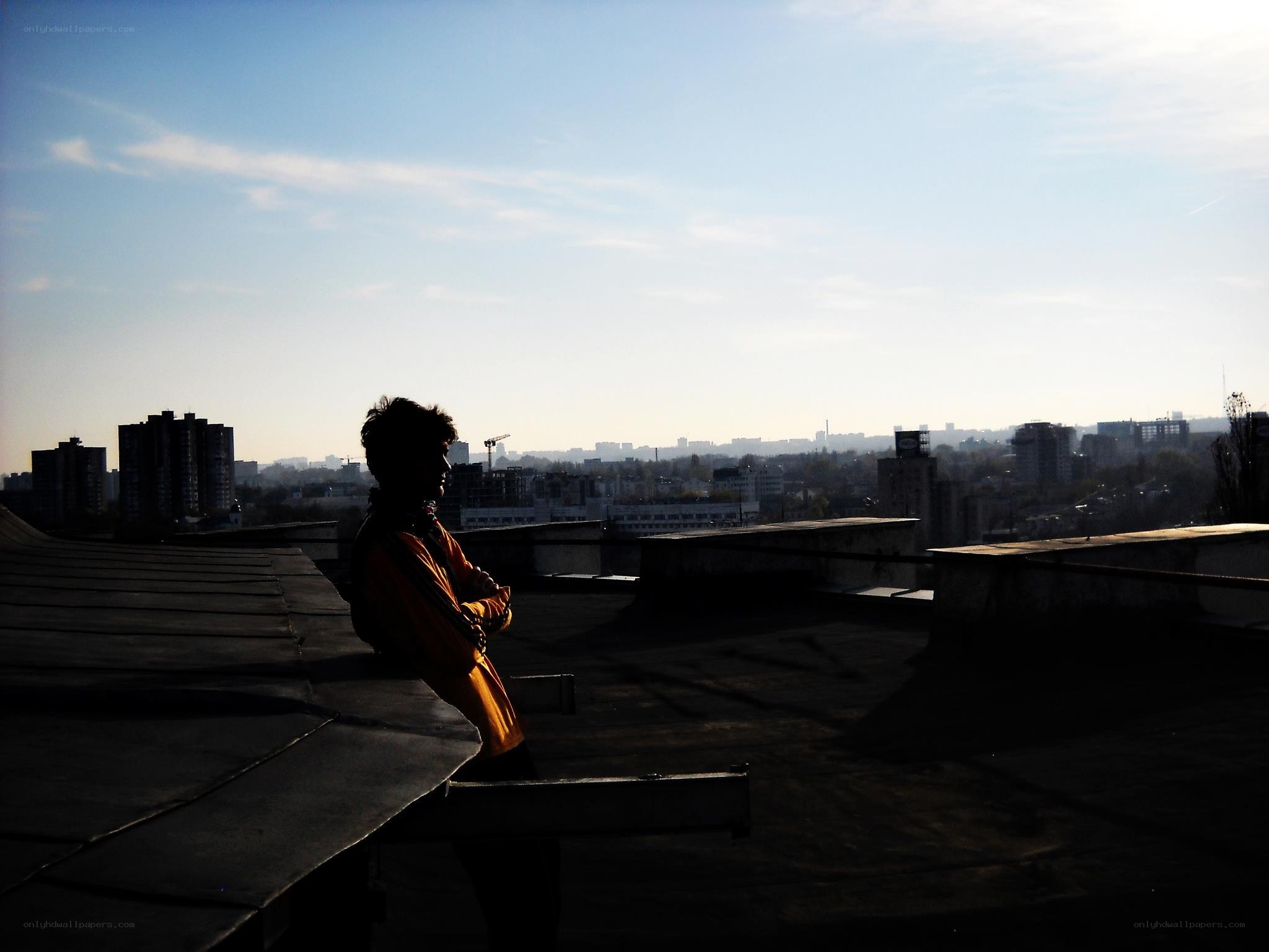Silhouette on a rooftop