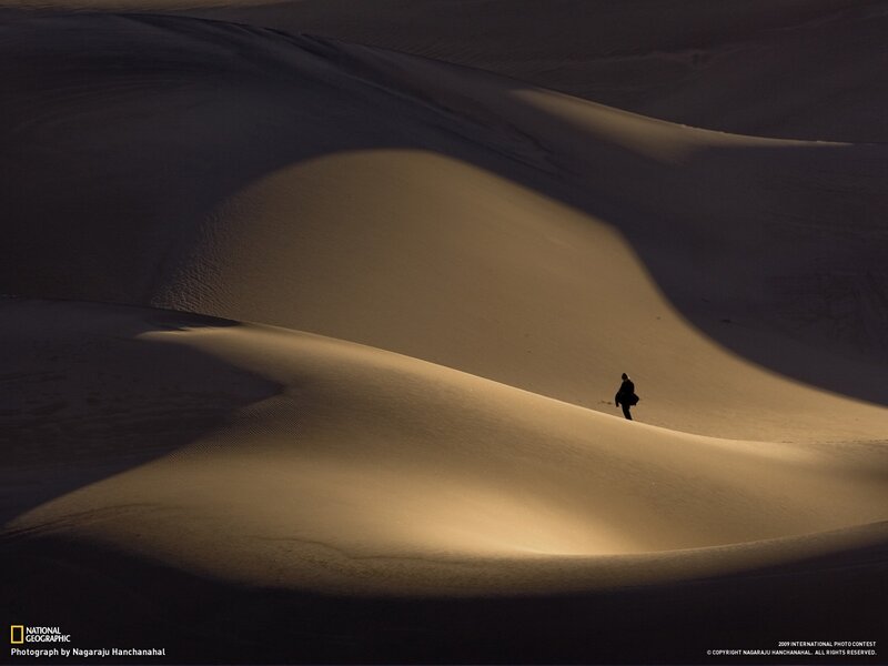 Silhouette on a sand dune