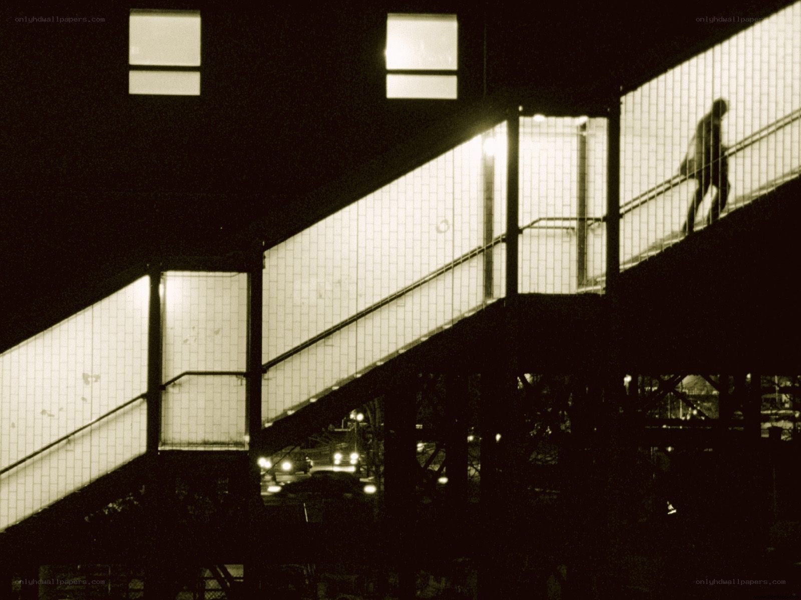 Silhouette on a Staircase at Night