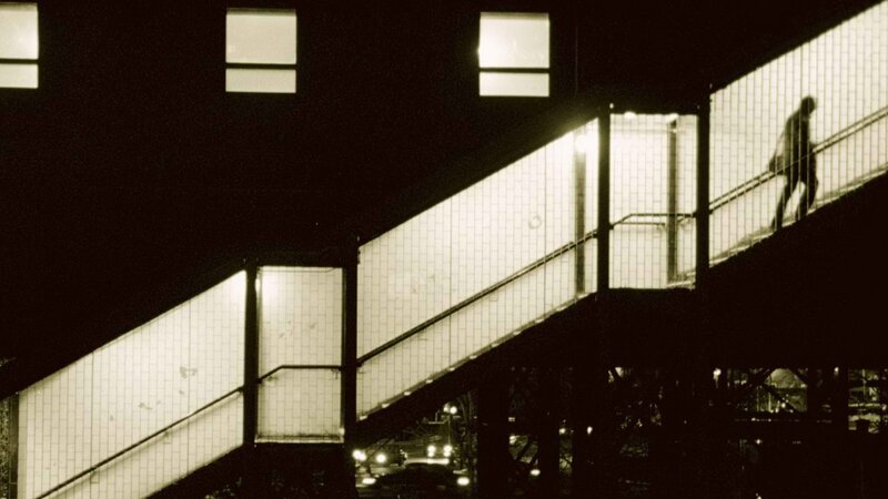 Silhouette on a stairway at night