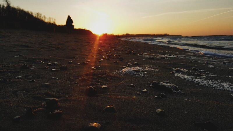 Silhouette on Beach at Sunset — Orange, Serene, Photograph