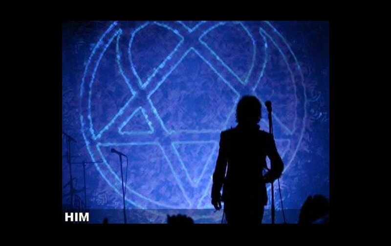 silhouette on stage with symbol